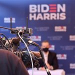 black and silver bicycle in front of the man in black shirt