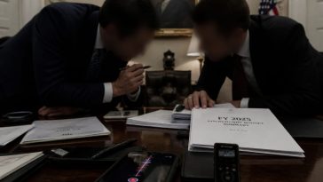 Hidden tape shows senior White House analyst saying get rid of Trump