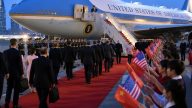 President Donald Trump’s Beijing Arrival Masks High‑Stakes Dealmaking