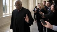 Justice Clarence Thomas Shrugs Off Reporter Before Big Rulings