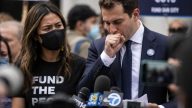 Councilmember Mamdani Caught Coughing Next to Masked Activist