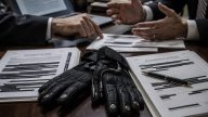 ICE Moving to Buy $20M Shock Gloves Through No‑Bid Contract