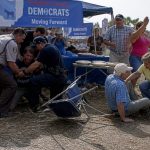 Armed Suspect Lunges at Democratic Nominee Amy Acton at Fair