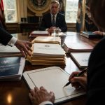 President Donald Trump orders OMB's Russ Vought to draft NIH veto order